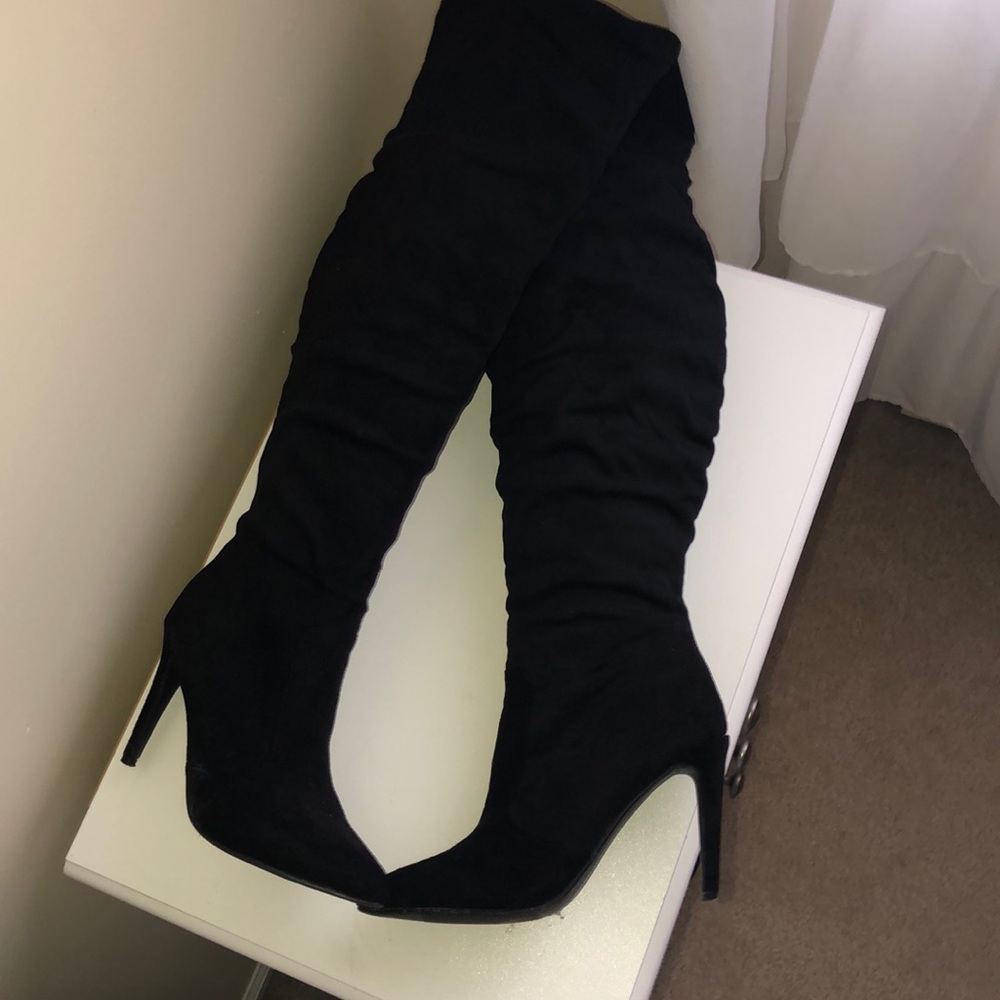 Tall black heel boots